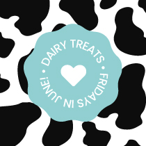 cow print background and light blue wavy circle badge with the words "Dairy Treats Fridays in June" in a circle inside the badge with a heart in the middle