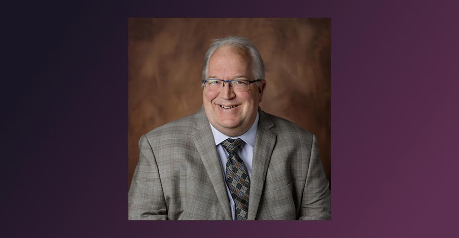 portrait of James (Jim) Meyer, Commercial Loan Officer in Shawano for AbbyBank on a purple gradient background